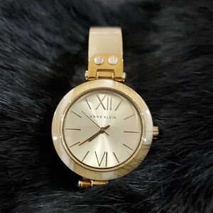 Anne Klein Gold and Cream Women's Watch Classic Timeless Iconic Lion Careee